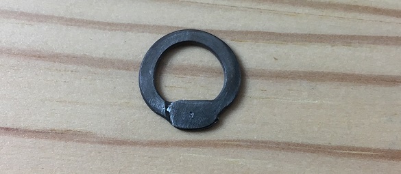 stainless steel chainmail ring with a mark, ready for the hole to be drilled