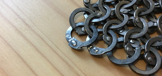 riveted stainless steel chainmail with a close up of the rivets