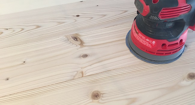 Palm sander on a table top