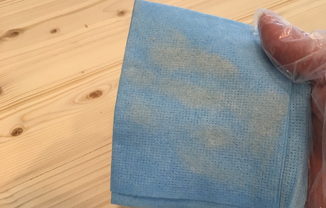 Tack cloth showing dust after sanding