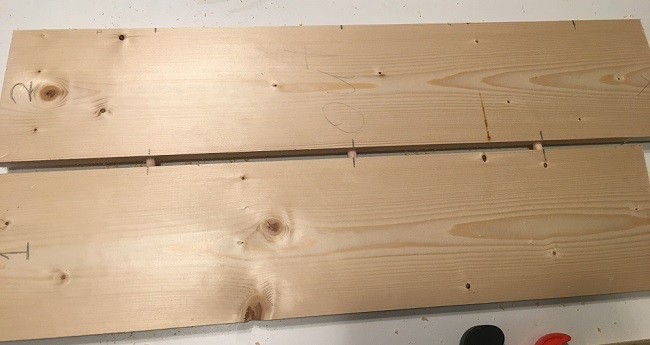 Boards for a heater shield joined with dowels